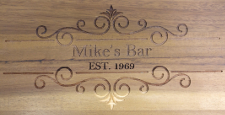 picture of detail of engraved wooden bar stool